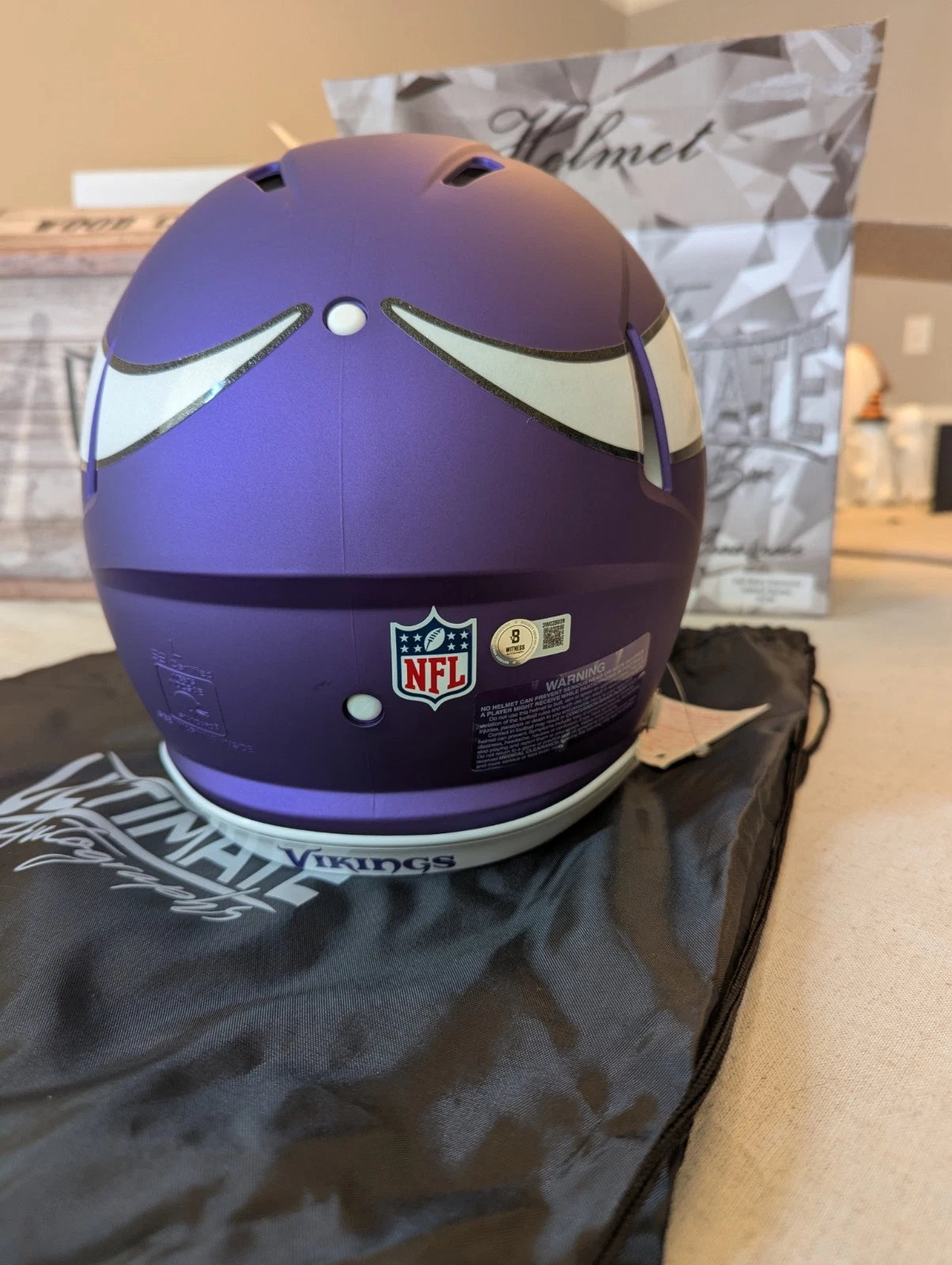 Rear view of Justin Jefferson BAS witnessed signed Minnesota Vikings full size helmet showing NFL shield.