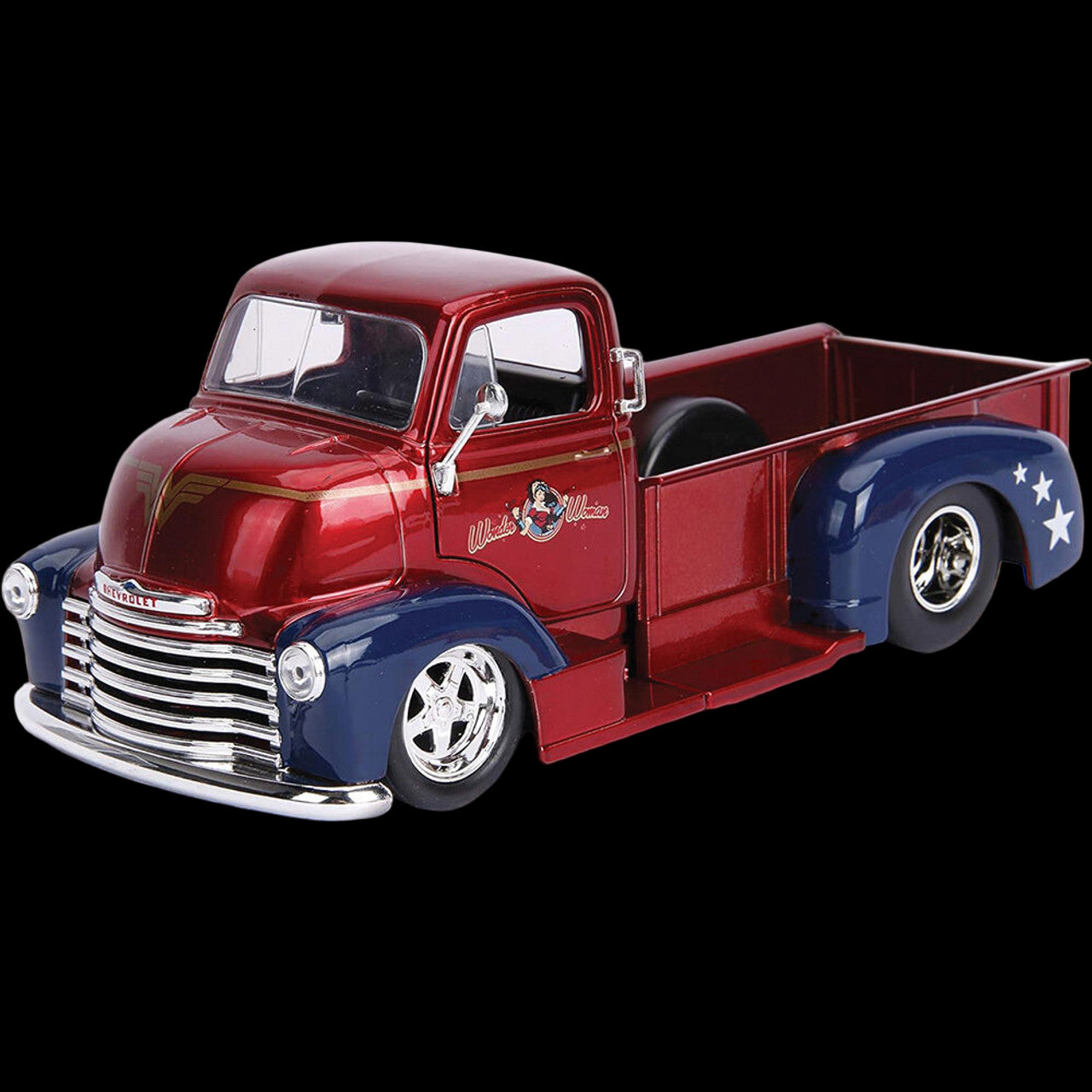 Angled view of Wonder Woman themed Chevrolet die-cast truck in red and blue with star details and logo on door – DC Collectible