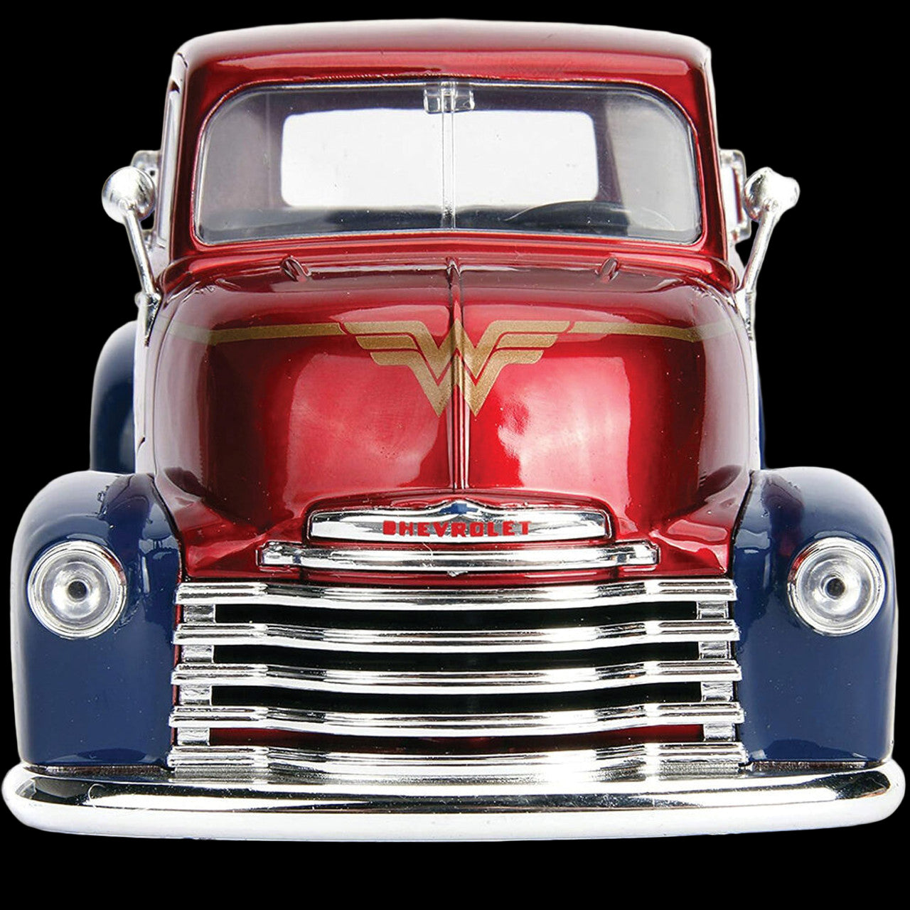 Front view of Wonder Woman themed Chevrolet die-cast truck with golden Wonder Woman emblem on hood – DC Collectible