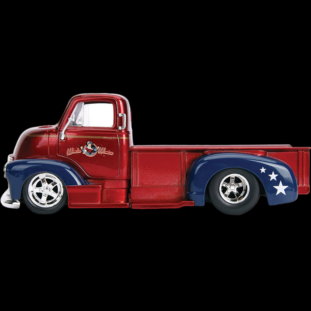 Side view of Wonder Woman themed Chevrolet die-cast truck in red and blue with stars on fender and Wonder Woman logo on door – DC Collectible
