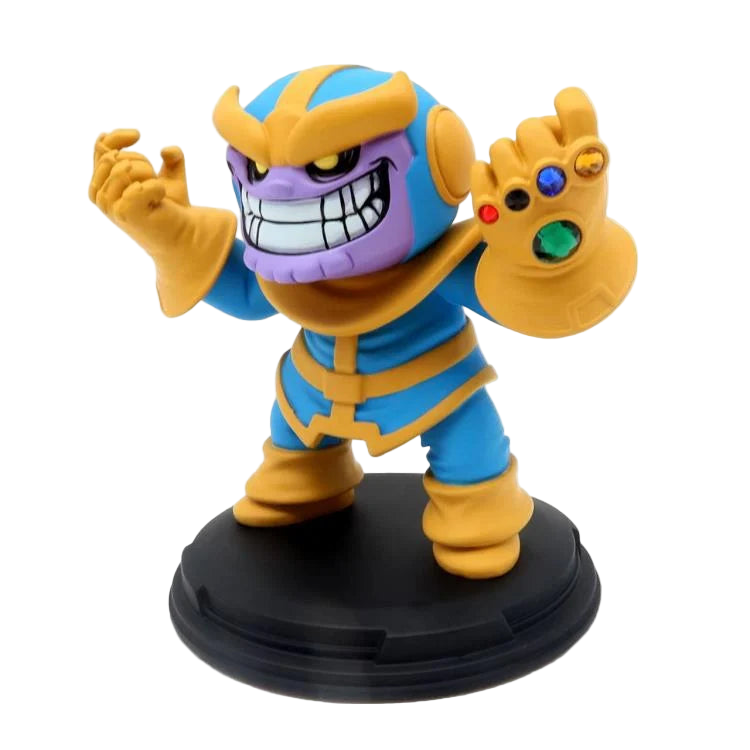 Left side angle of Thanos Q-Fig diorama showing his menacing smile, detailed armor, and Infinity Gauntlet gems.