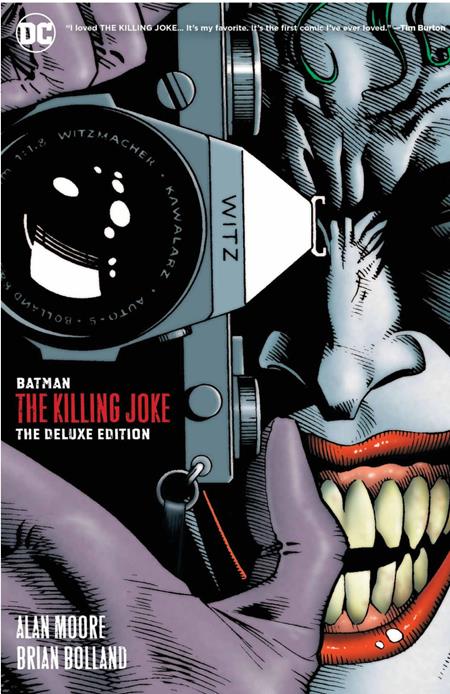 Cover of Batman: The Killing Joke HC New Edition – the Joker grinning maniacally behind a camera lens.