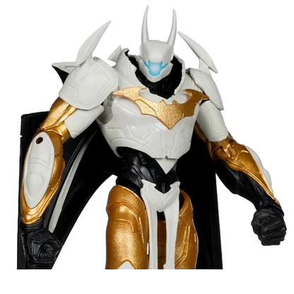 Close-up of McFarlane DC Multiverse Batman Final Batsuit MegaFig showing white armor, gold emblem, and blue illuminated eyes with wings folded behind.