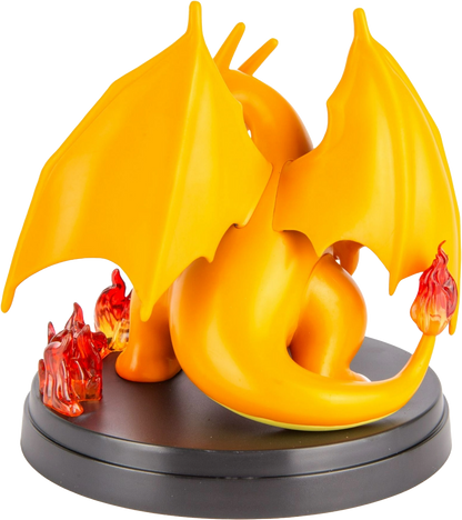 Rear view of the Charizard figure with wings and fire base.