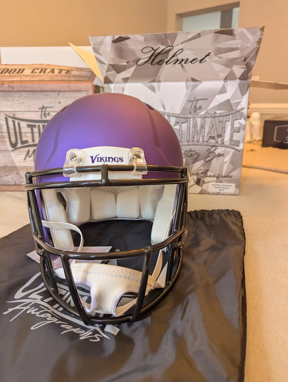Front view of Justin Jefferson BAS witnessed signed Minnesota Vikings full size helmet with facemask.