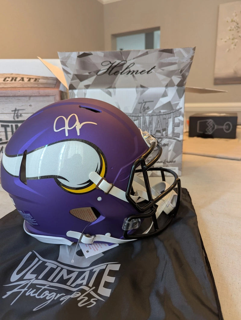Justin Jefferson BAS witnessed signed Minnesota Vikings full size helmet side view with autograph.