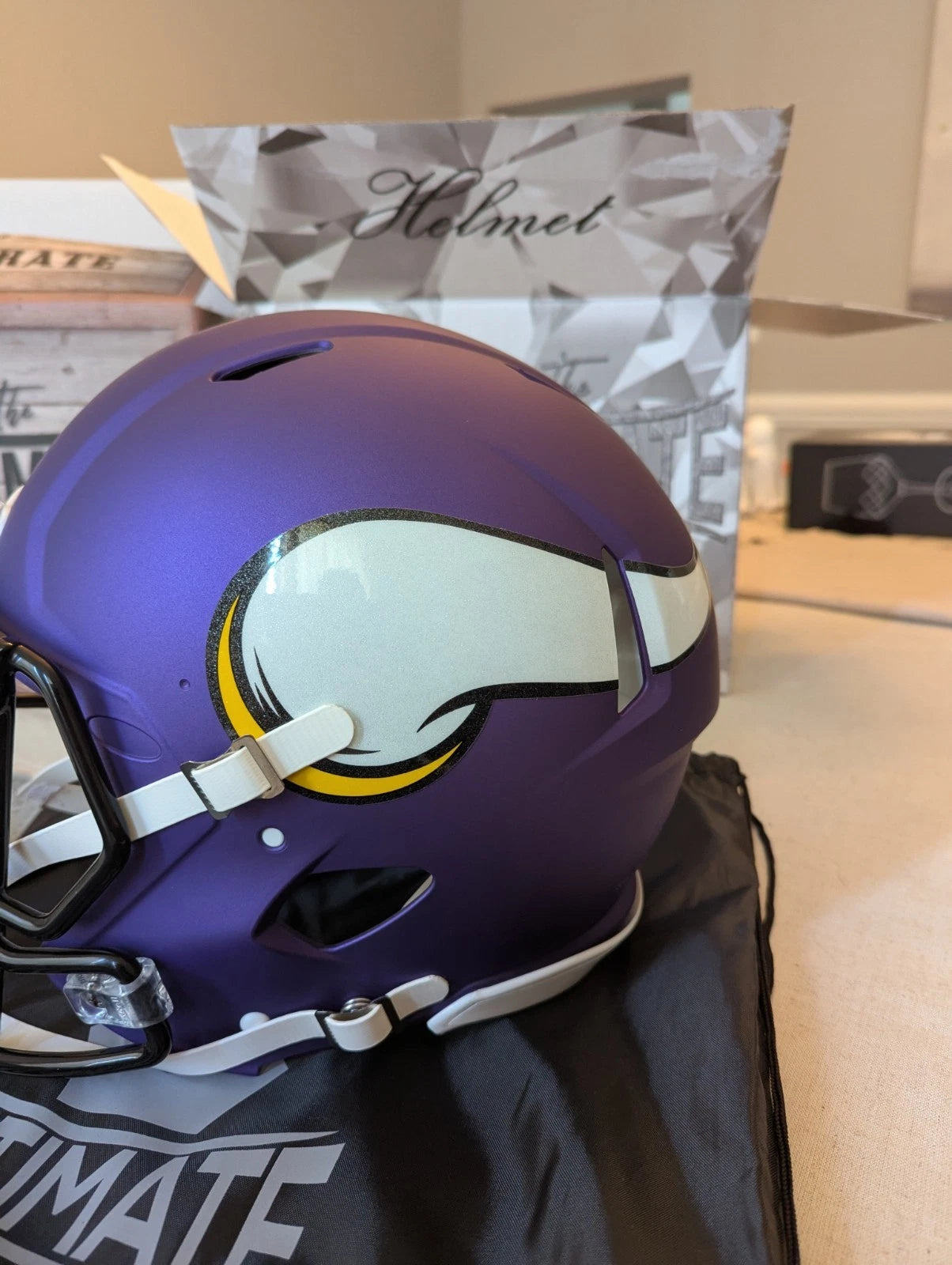 Minnesota Vikings full size helmet side profile showing Vikings logo signed by Justin Jefferson.