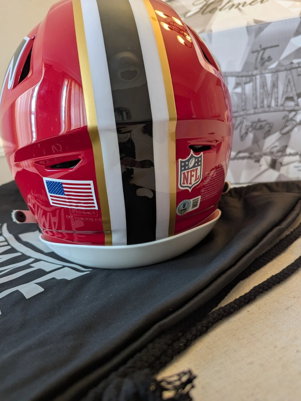 Rear view of Atlanta Falcons 66–69 throwback Speed Flex helmet signed by Kyle Pitts.