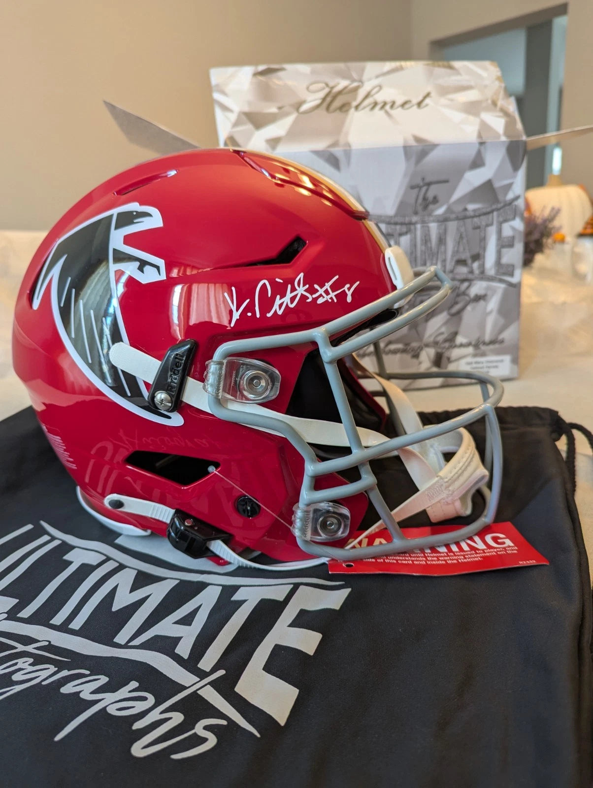 Kyle Pitts BAS authenticated Atlanta Falcons 66–69 throwback Speed Flex helmet side view with autograph.