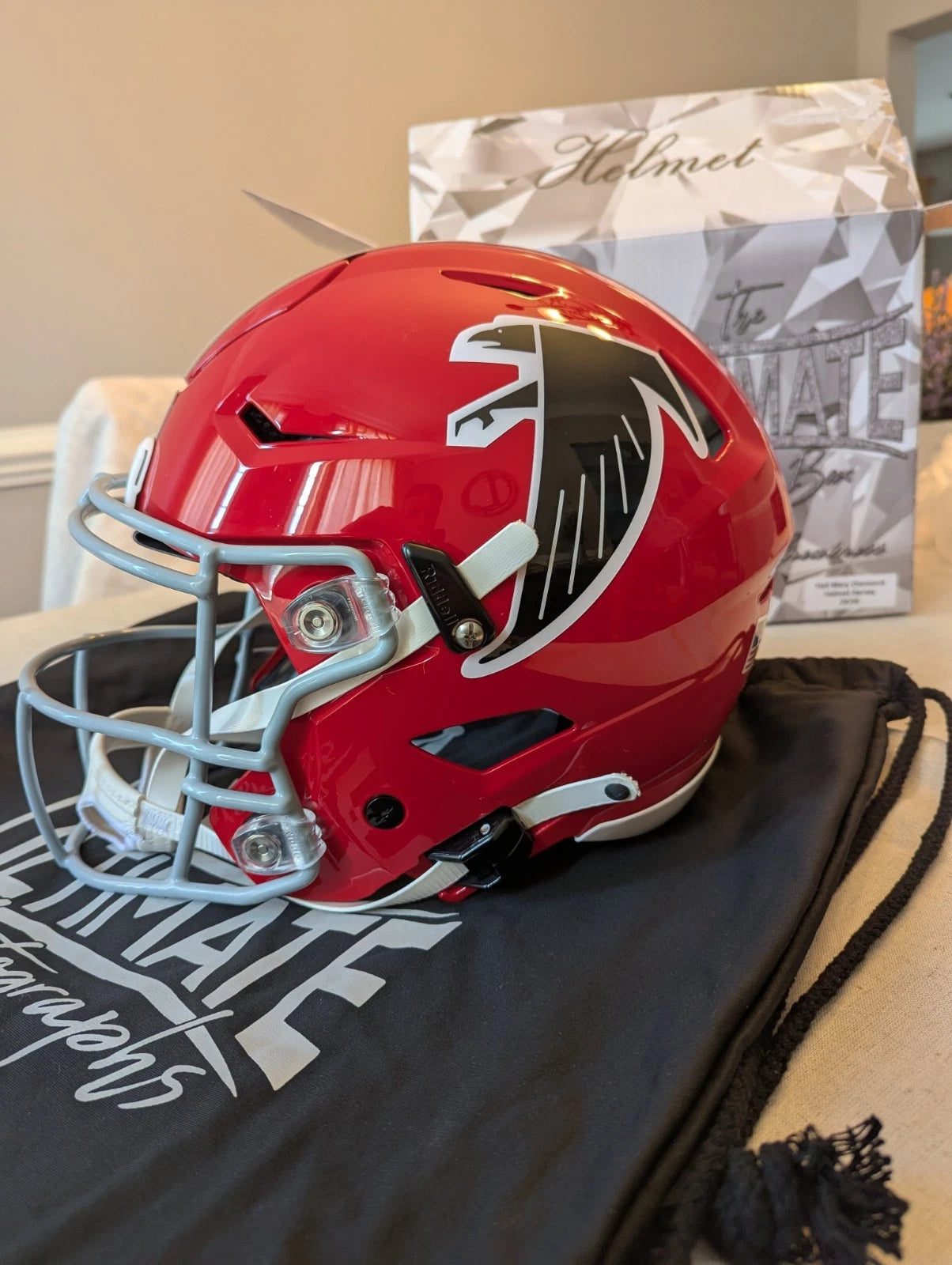 Atlanta Falcons 66–69 throwback Speed Flex helmet side profile showing Falcons logo.