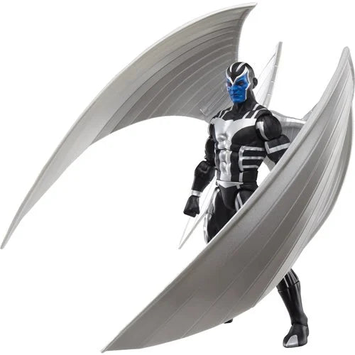Marvel Legends X-Force Archangel action figure posed with curved metallic wings folded forward in defensive stance, detailed black-and-silver armor visible.